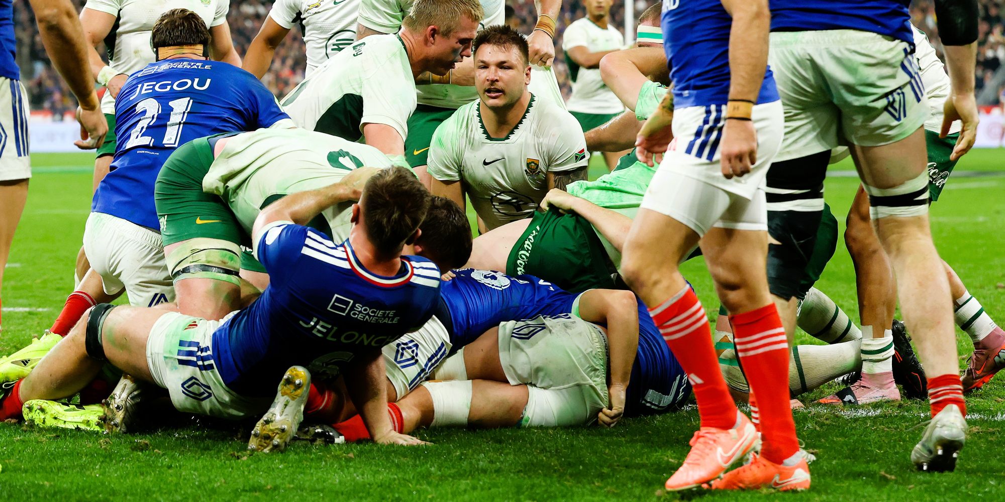 Andre Esterhuizen emerges from a pile of bodies after his maul try.