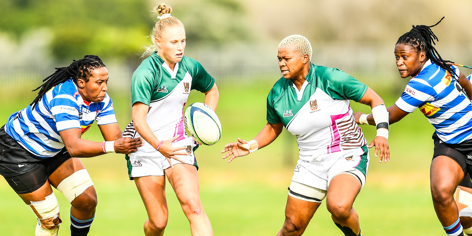 Four Springbok Women in action in the Women's Premier Division Final: Nolusindiso Booi tries to tackle Eloise Webb, with Aphiwe Ngwevu in support for the Border Ladies, and Zintle Mpupha (far right) also on defence for DHL WP.