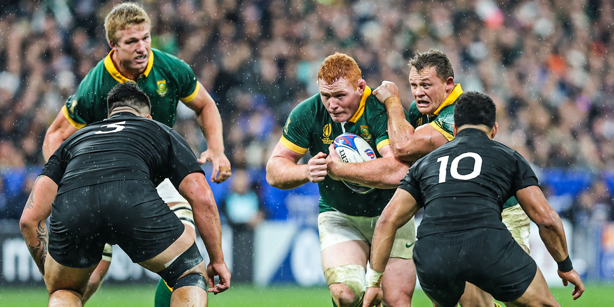 On the attack in the Rugby World Cup final against New Zealand in 2023, with Pieter-Steph du Toit and Deon Fourie in support.