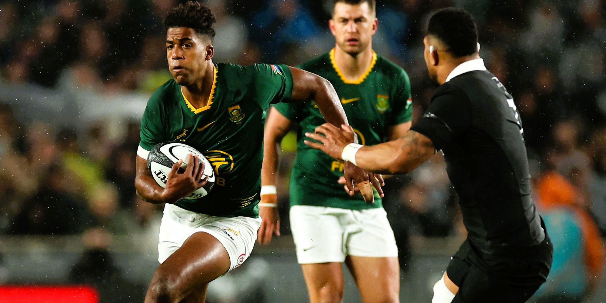 Canan Moodie tries to evade the All Black defence.